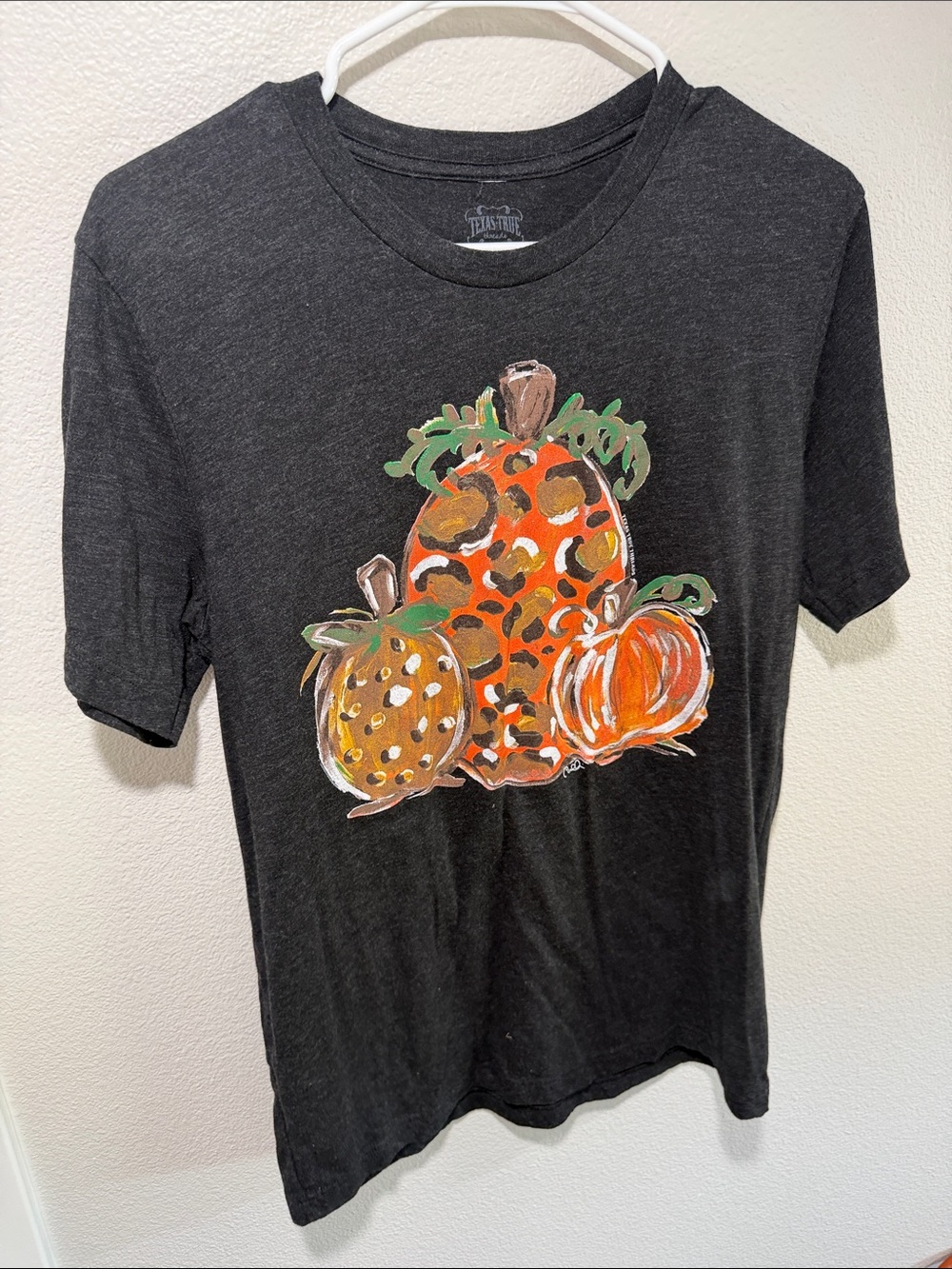 Black Short Sleeve Tee with Pumpkin Trio Graphic - Unbranded